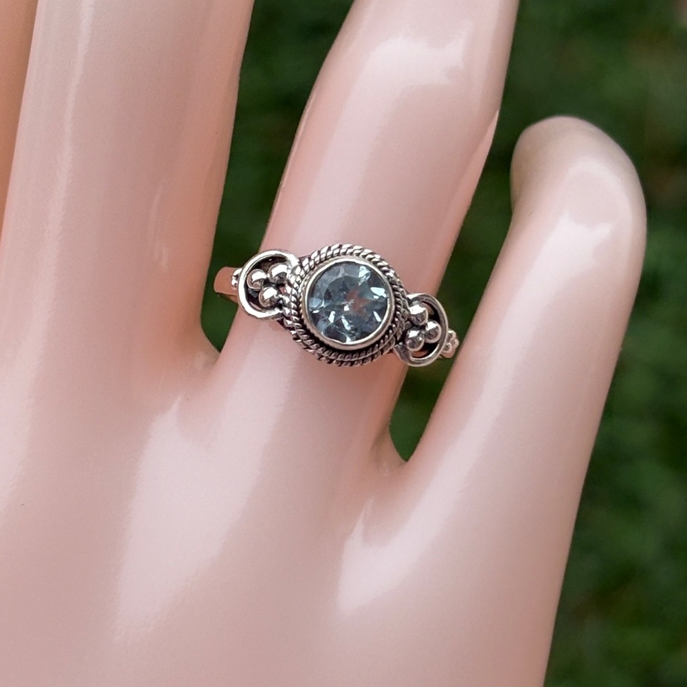 Delicate Silver Ring with Light Blue Gemstone